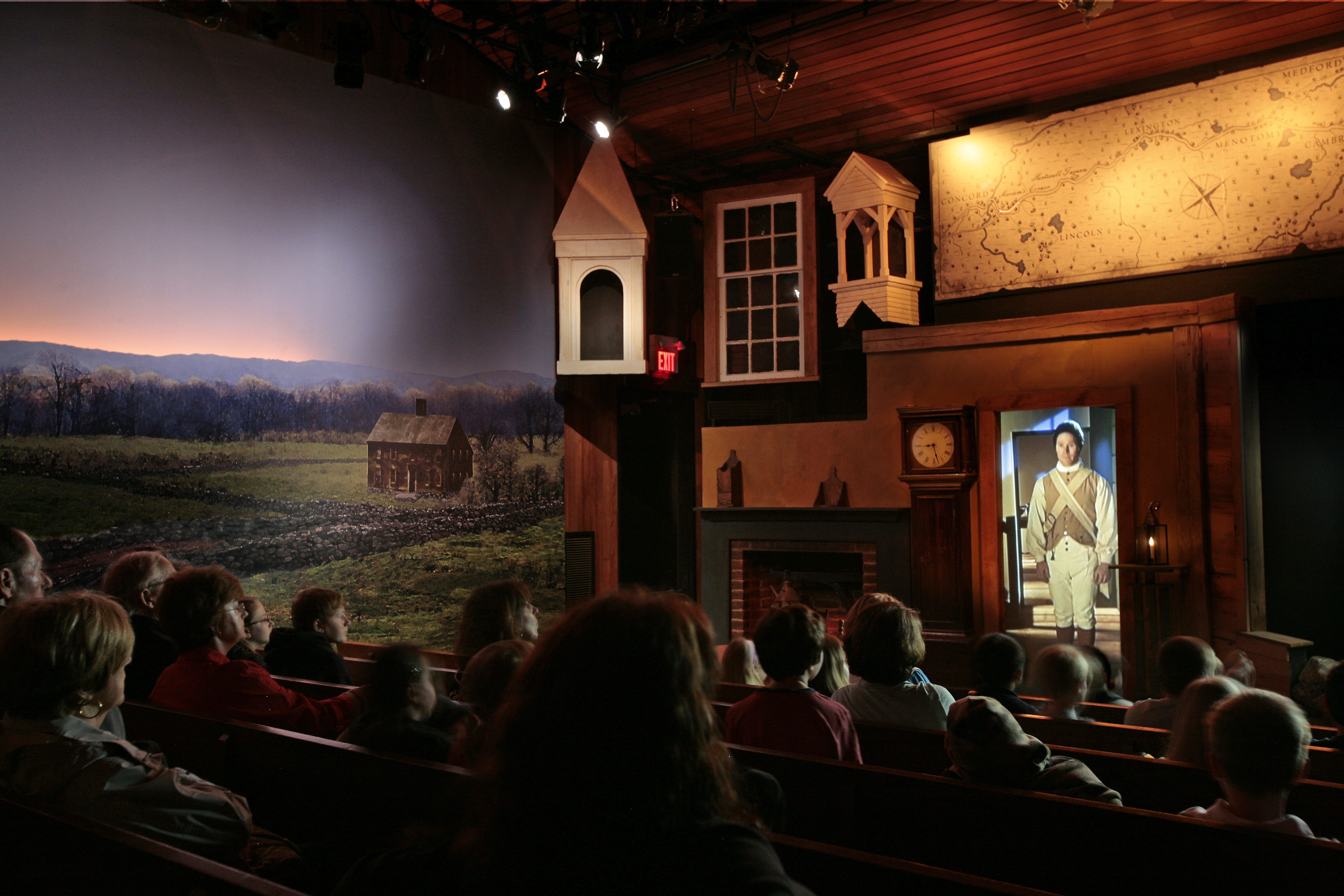 Darkened theater with lighted multimedia features