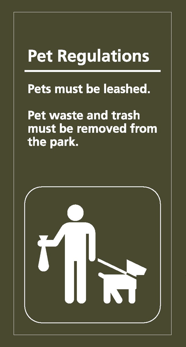 brown information sign. Human figure holding the leash of a dog and a bag of pet waste