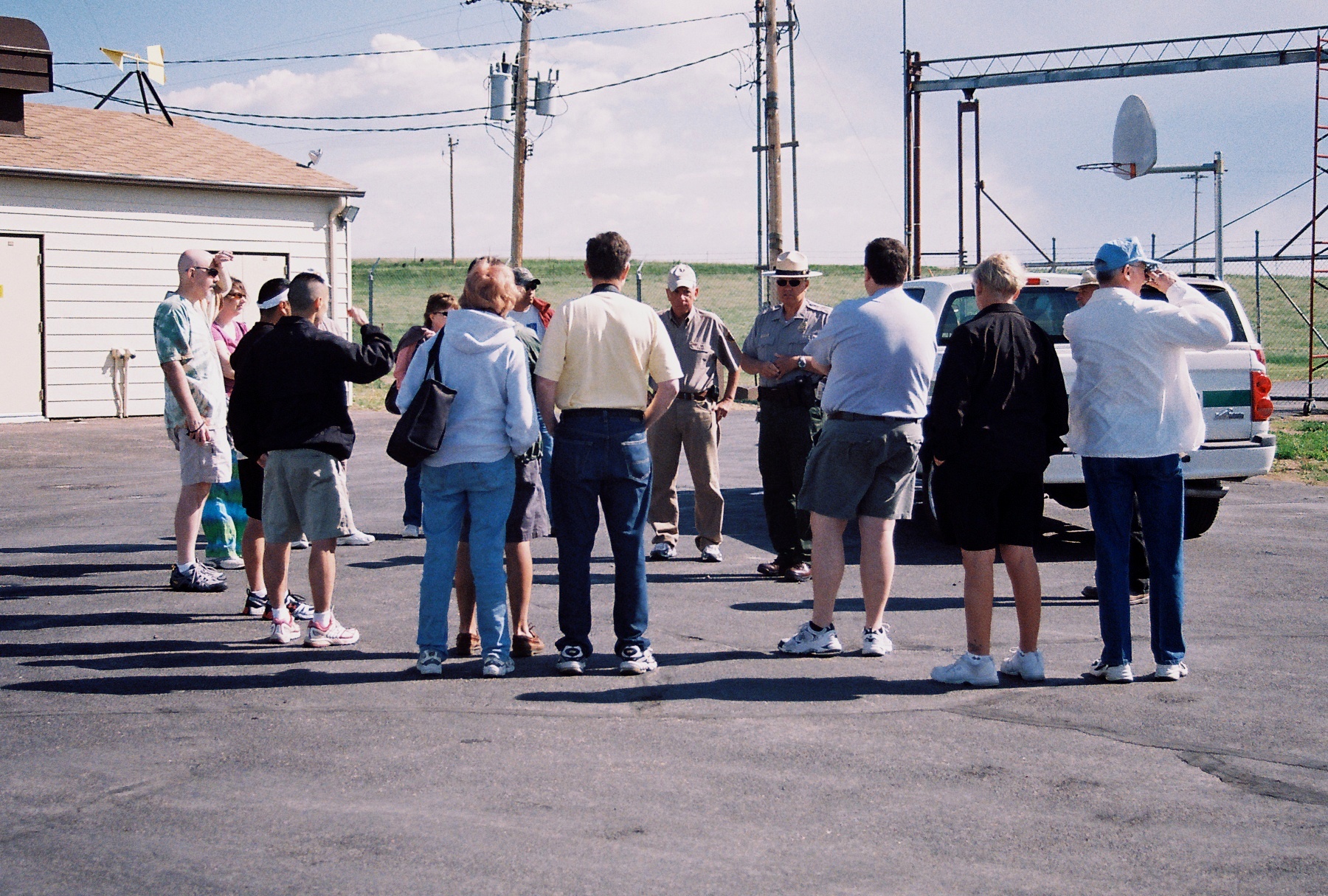 A Park Ranger greets a group of visitors outside of Launch Control Facility Delta-01 A Park Ranger greets a group of visitors outside of Launch Control Facility Delta-01