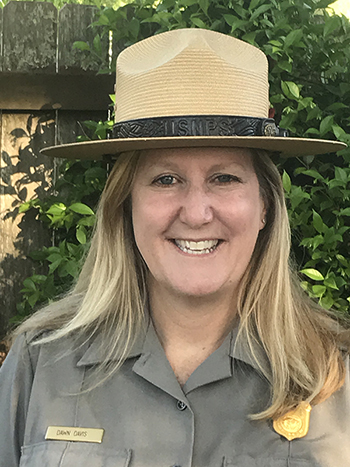 Dawn Davis, superintendent
Mill Springs Battlefield National Monument
NPS Photo Woman wearing a NPS uniform smiles broadly.