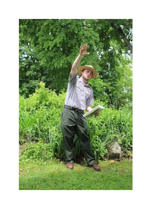 A park ranger leading a talk