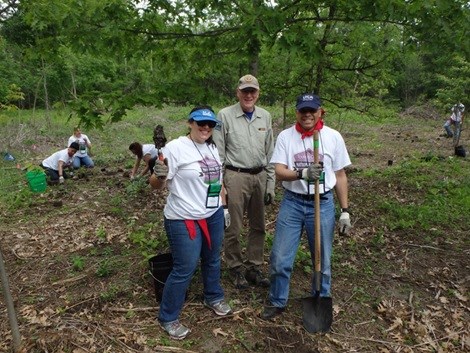 Volunteers prepare their tools.