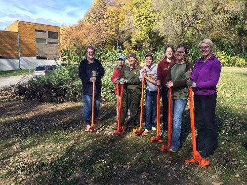 Volunteers and their tools ready to work on habitat restoration.