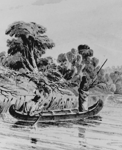 Two Native Americans paddle a canoe on a river.
