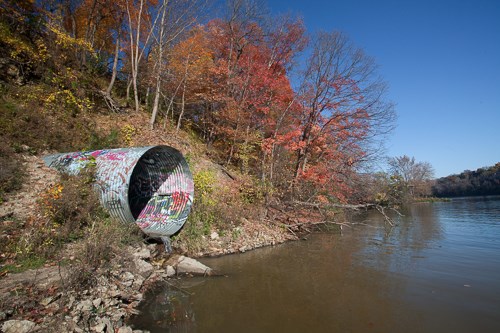 A large culvert diverts water to the Mississippi River.