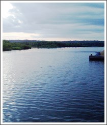 A dark and cloudy day over the Mississippi River.