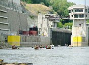 Canoes locking through a dam on the Mississippi River.