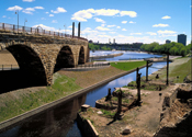 Ruins of flour mills dot the shoreline of the Mississippi River in Minneapolis.