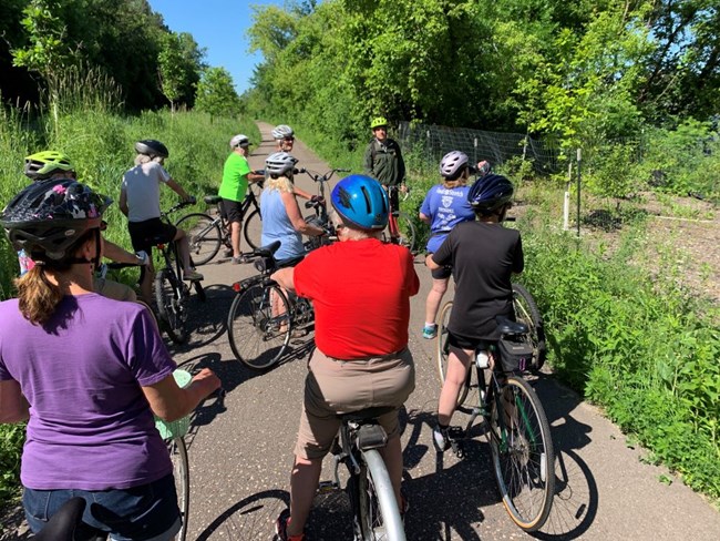 Ranger Alex leading a Bike With A Ranger Program