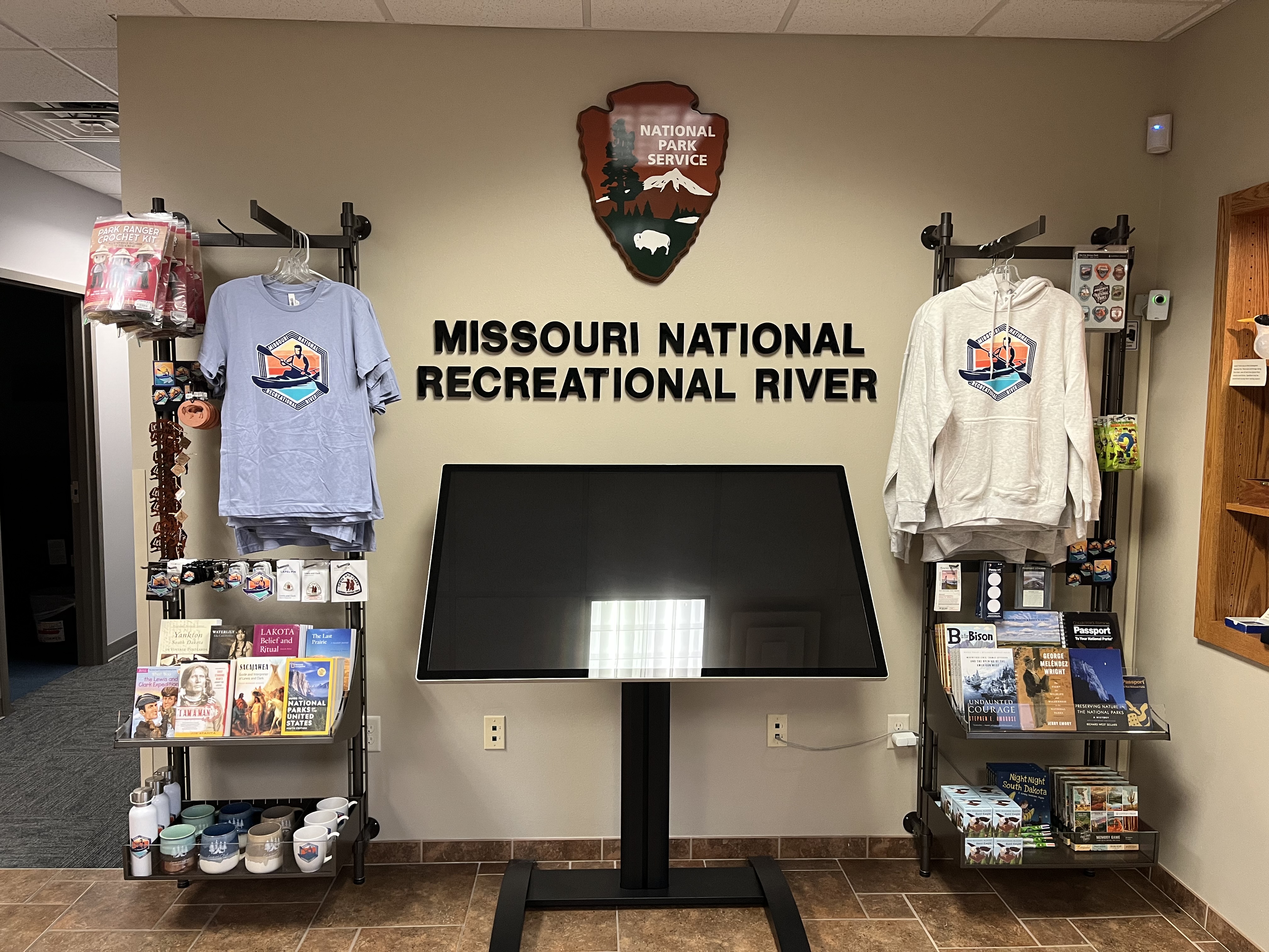 Photo of two merchandise racks with merchandise sold at Missouri National Recreational River Headquarters
