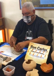 Ron Carlos with his pottery