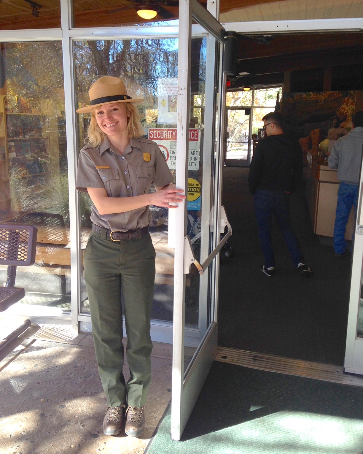 Ranger Kathryn holding the door open at the visitor center Ranger Kathryn holding the door open at the visitor center