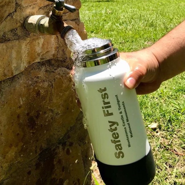 Water bottle being filled