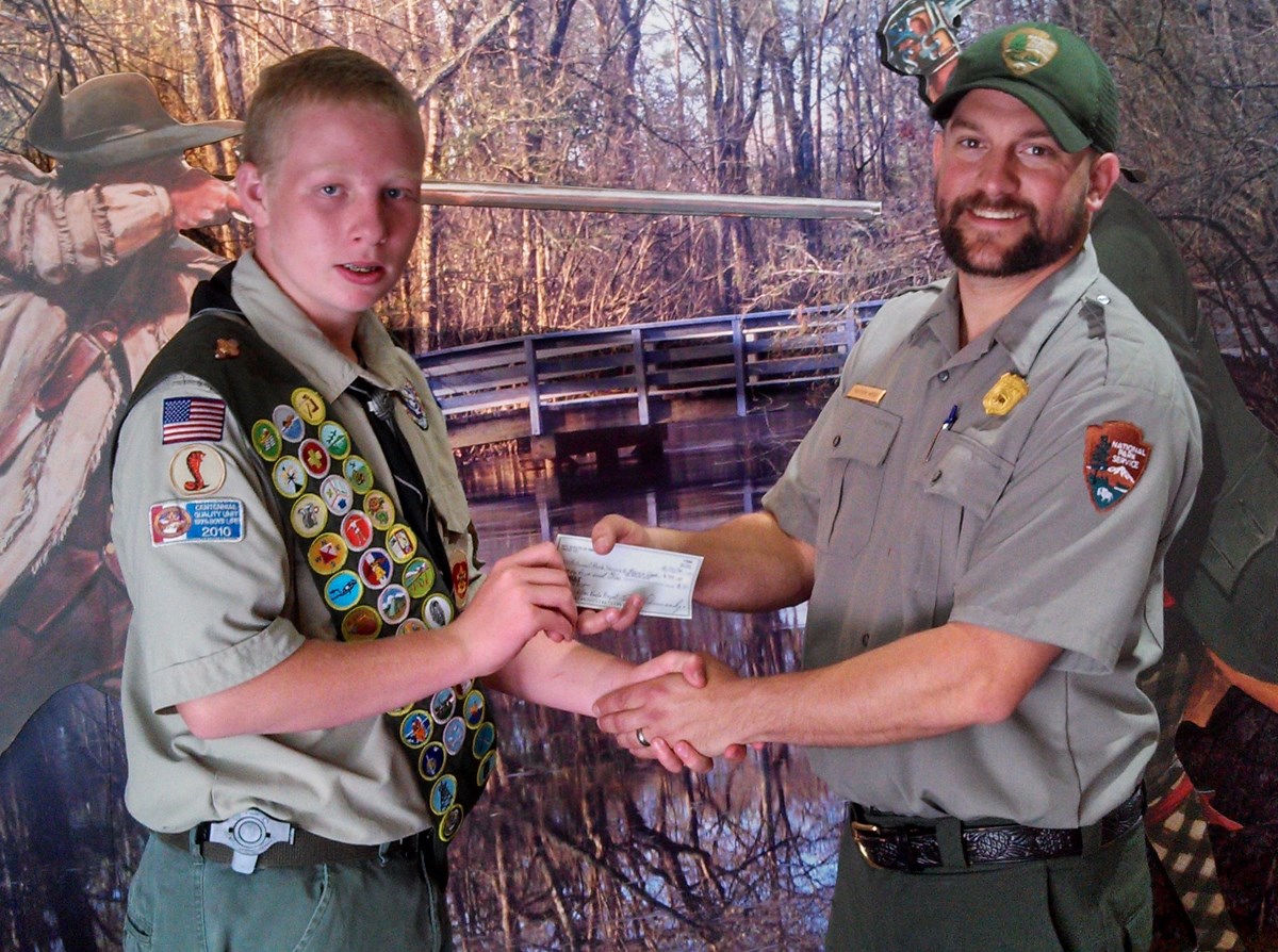 Eagle Scout Nathan Ellen making a donation to Moores Creek National Battlefield Eagle Scout Nathan Ellen making a donation to Moores Creek National Battlefield