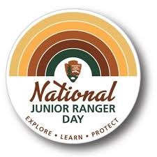 Junior Ranger Hat on a white button with orange and green colors