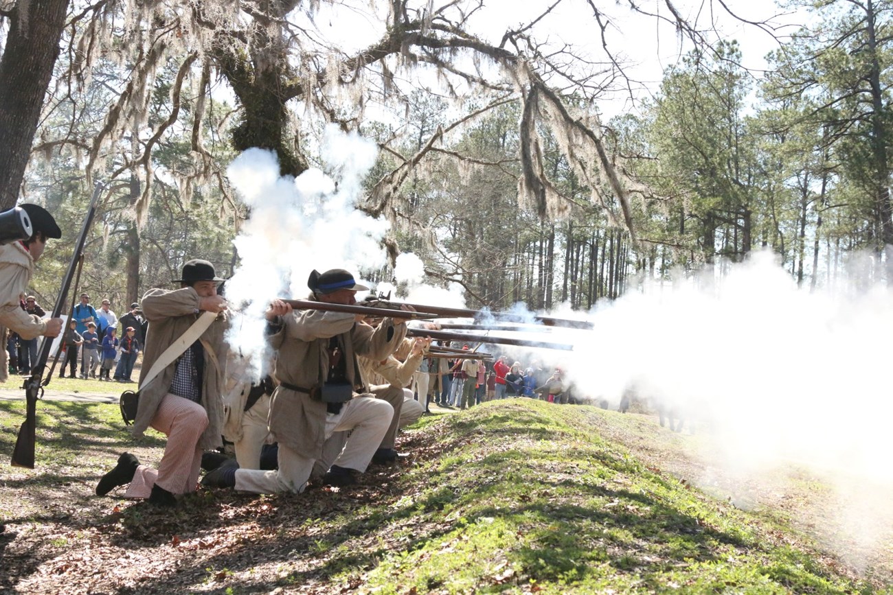Minute Men Firing Muskets