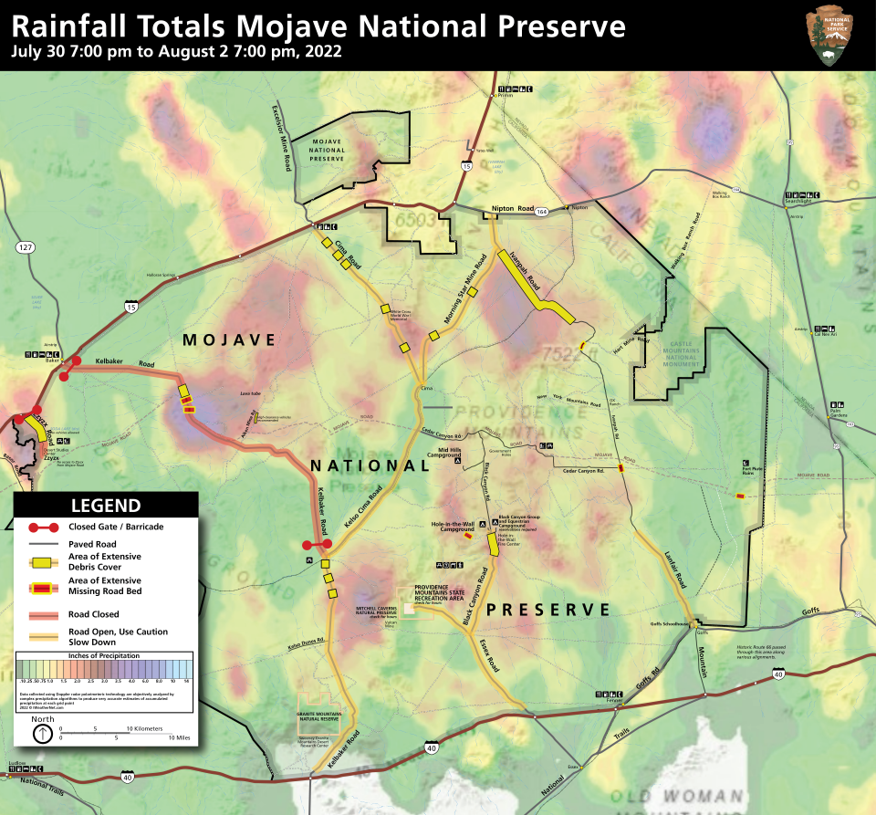 Map of preserve roads, with closed gate symbols at Zzyzx Road and Kelbaker Road north of Kelso. Base map is rainfall intensity that coincides with road damage symbols on Kelbaker, Ivanpah, and Zzyzx Roads