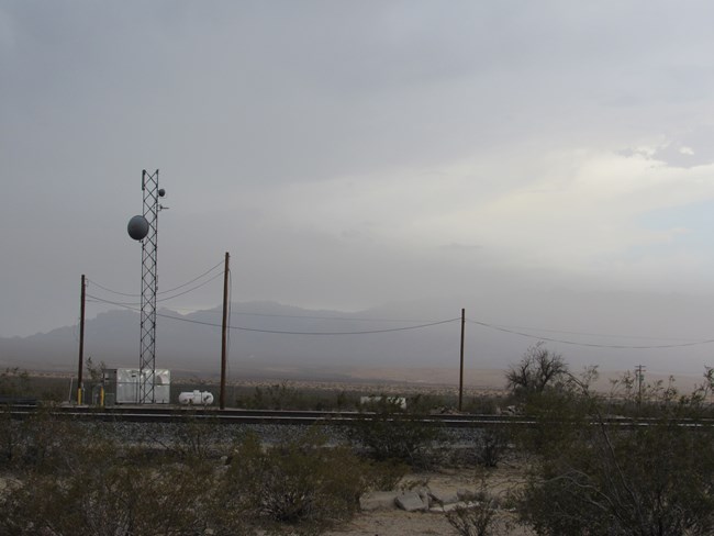 Rain over the Providence Mountains in Mojave National Preserve.