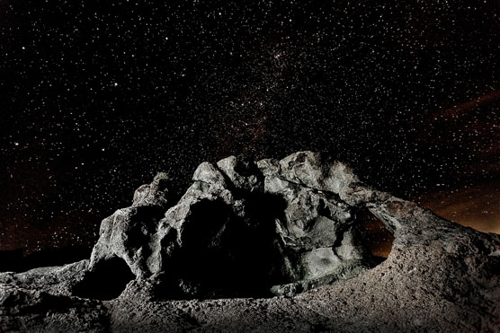 photo of rocks in the moonlight