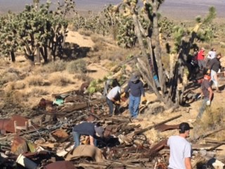 Overland bound photo before Photo of volunteers removing trash at Death Valley Mine
