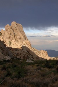 Storm builds above the Granite Mountains.