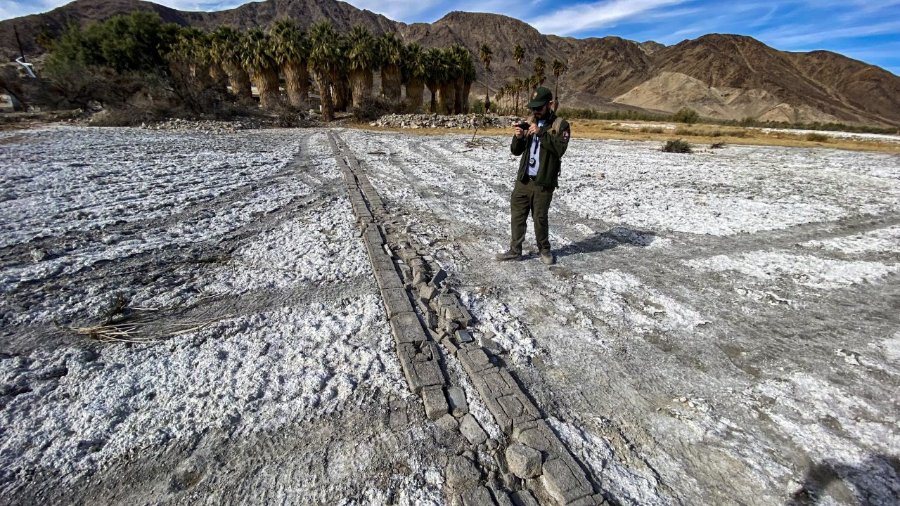 an archeologist surveys cultural resource damage at soda dry lake