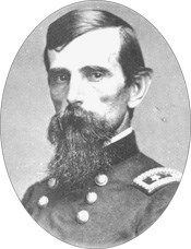 Head and shoulder view of late middle-aged man with long beard and mustache wearing a Union army uniform.