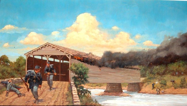 Union soldiers burning the wooden covered bridge during the Battle of Monocacy