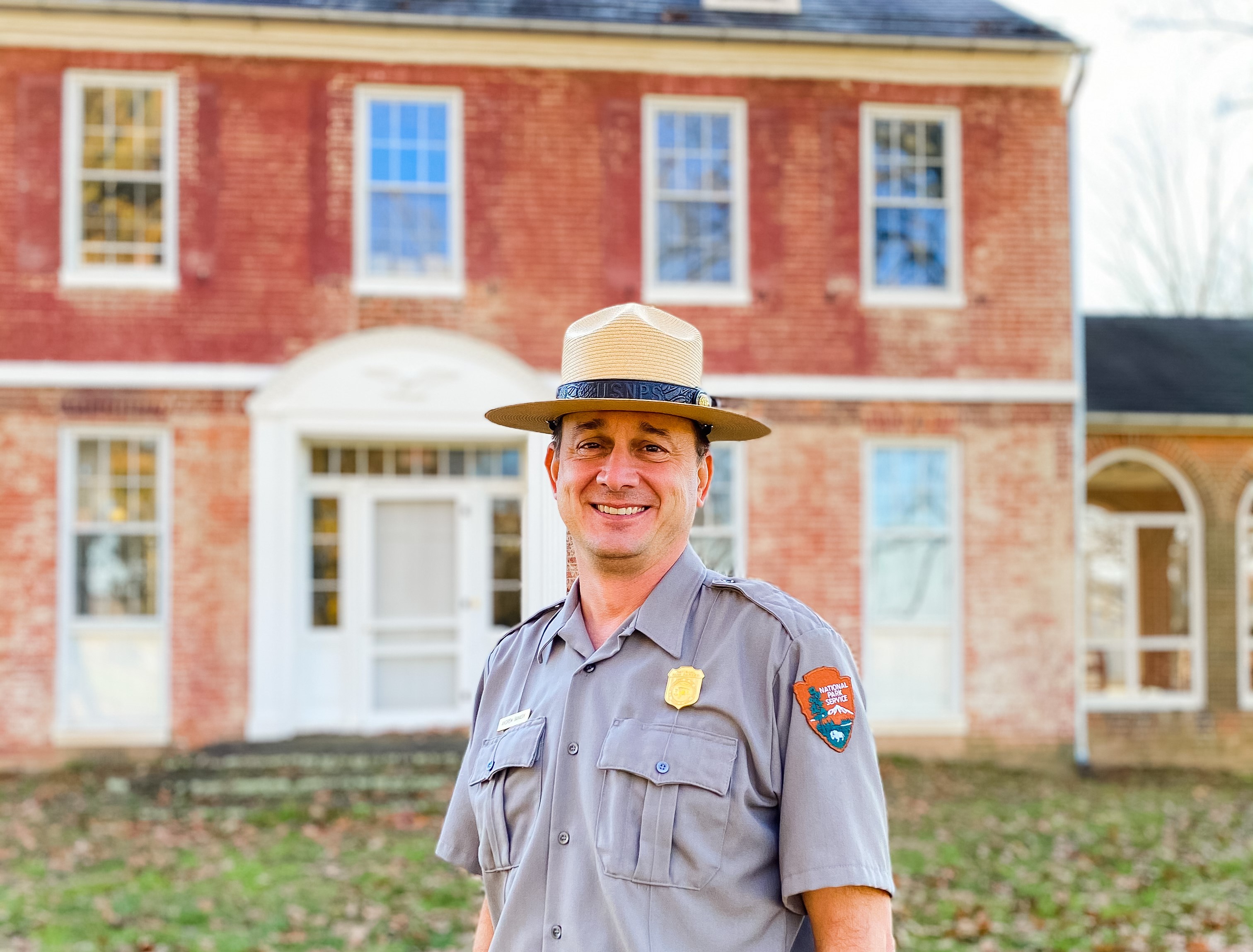 Andrew Banasik stands in front of Thomas House at Monocacy National Battlefield
