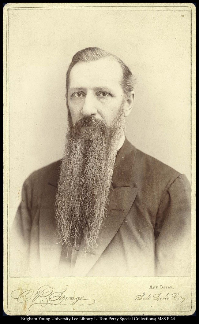 A bust of a man with a long beard.