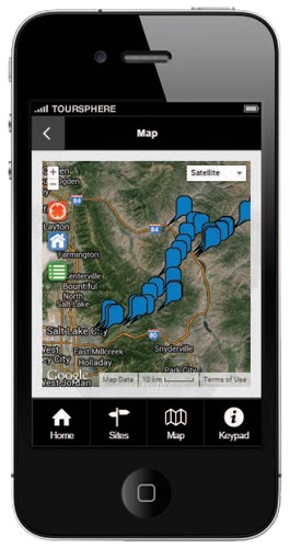 A black iphone showing a google map on the screen with blue balloons symbolizing places to visit. A black iphone showing a google map on the screen with blue balloons symbolizing places to visit.