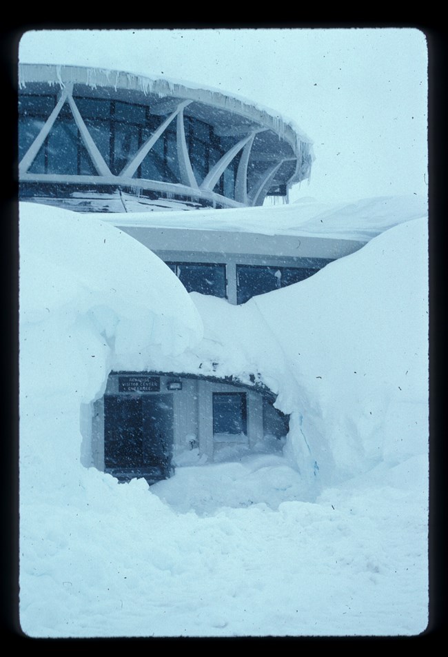 First Jackson Visitor Center almost buried under snow with entrance dug out.