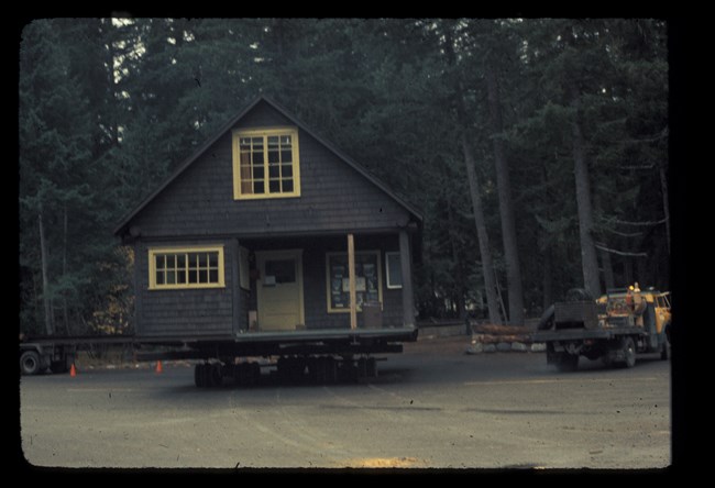 Longmire Museum moving across the road on large trailer.