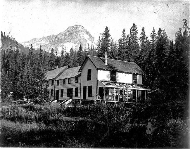 Longmire Springs Hotel in the 1910s. Black and white image of Longmire Springs Hotel built by the Longmire family in the 1890s.