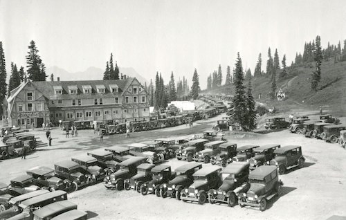Rows of parked cars in a sub-alpine environment