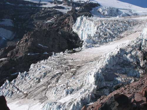 A helicopter files over Kautz glacier.