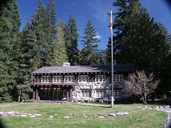 The Longmire Administration building has large river tumbled smooth boulders and full round logs accentuating its facade.