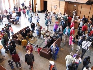 Looking down from the second floor of the Jackson Visitor Center at a large number of people in the lobby . Looking down from the second floor of the Jackson Visitor Center at a large number of people in the lobby .