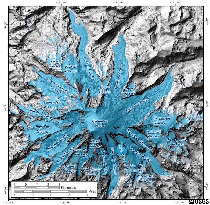 A topographic relief map of Mount Rainier with the glaciers shaded in blue and labeled.