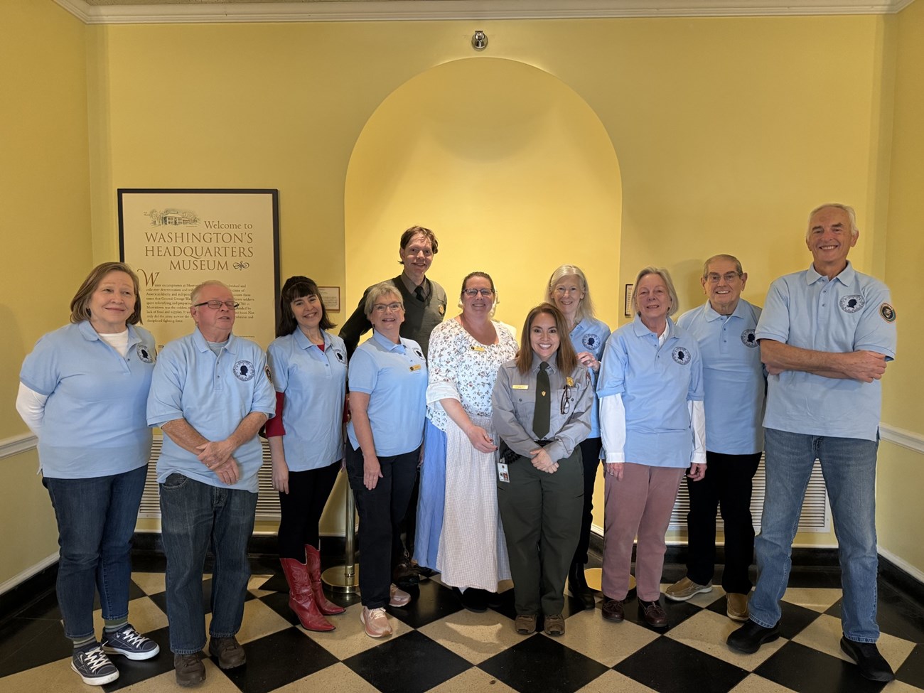 Volunteers from Interpretation & Education Division stand with park staff at Washington HQ Museum