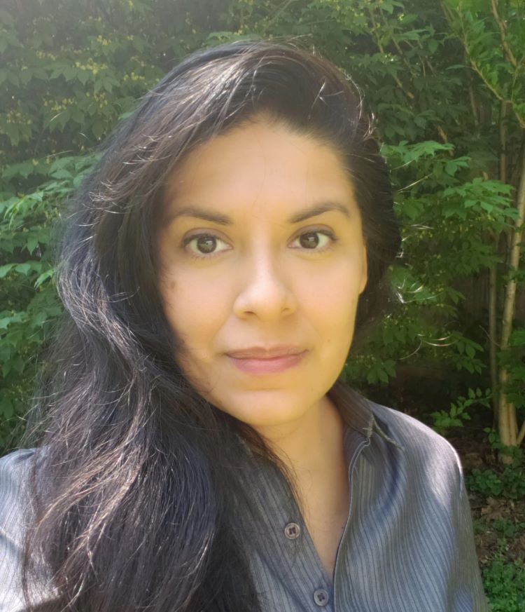 Fairleigh Dickinson University Professor, Dr. Luz Huertas Head shot photo of Fairleigh Dickinson University Professor Dr. Luz Huertas and the Libro de Cofradias