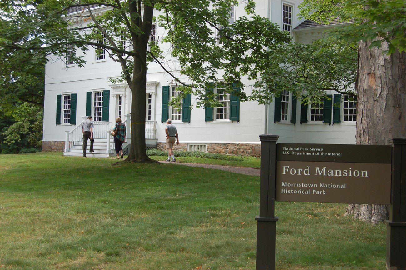 Visitors approaching the entrance to the Ford Mansion