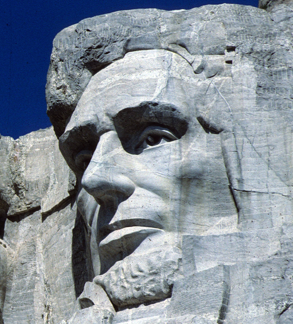 Who are the four faces of Mt. Rushmore?