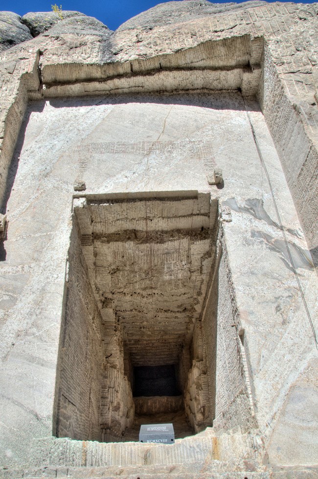The entrance to the unfinished Hall of Records, with a granite capstone covering the vault at the bottom of the photo.