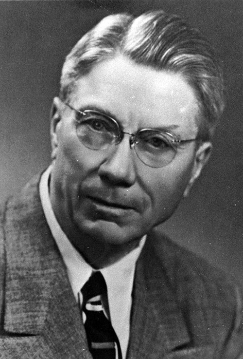 Black and white photograph of United States Congressman William Williamson.  He is a white male, wears glasses and a dark suit, white shirt dark necktie and is turned slightly to the right but looking directly at the photographer.