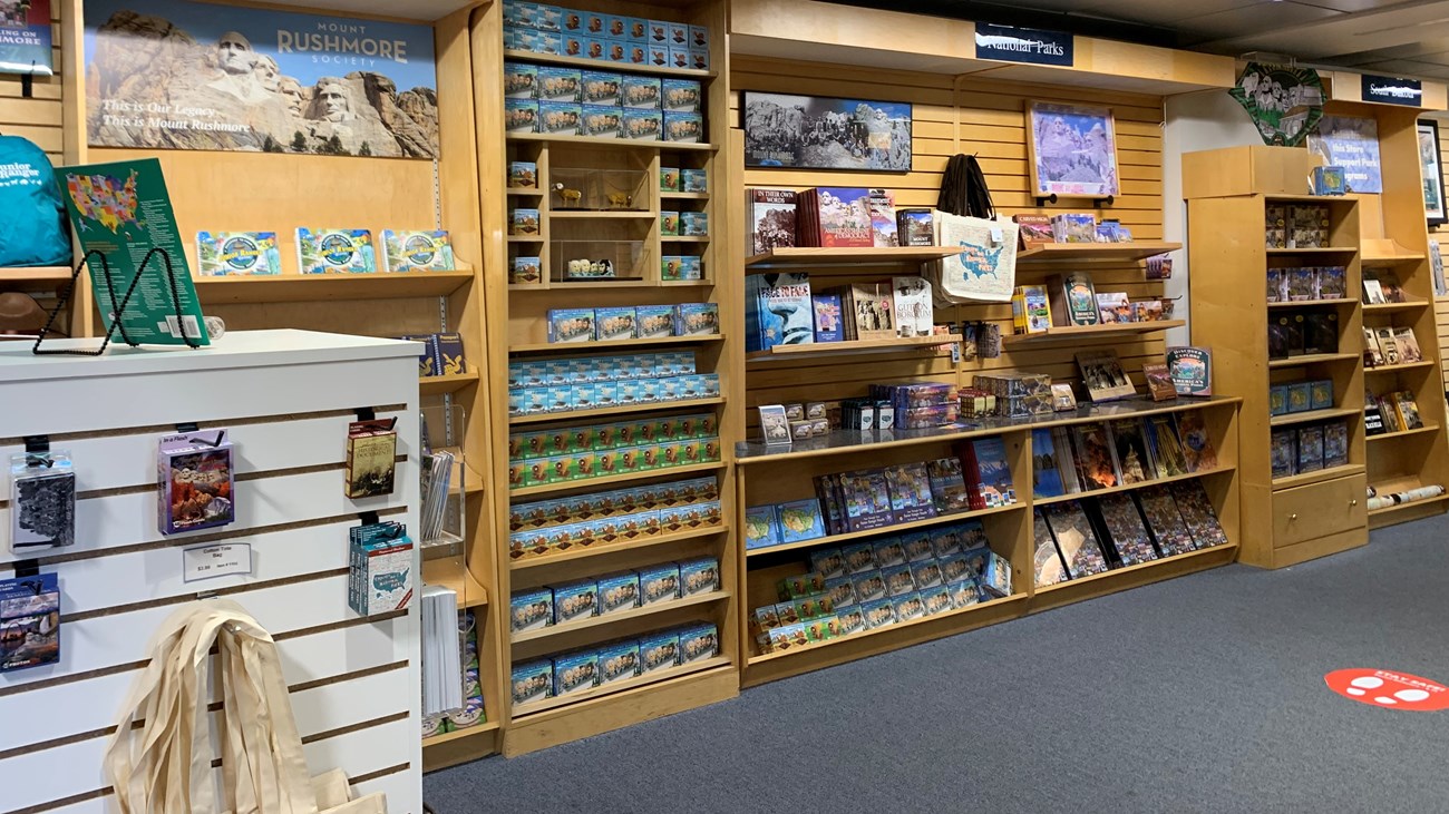 Brown wall of shelves filled with merchandise in a bookstore