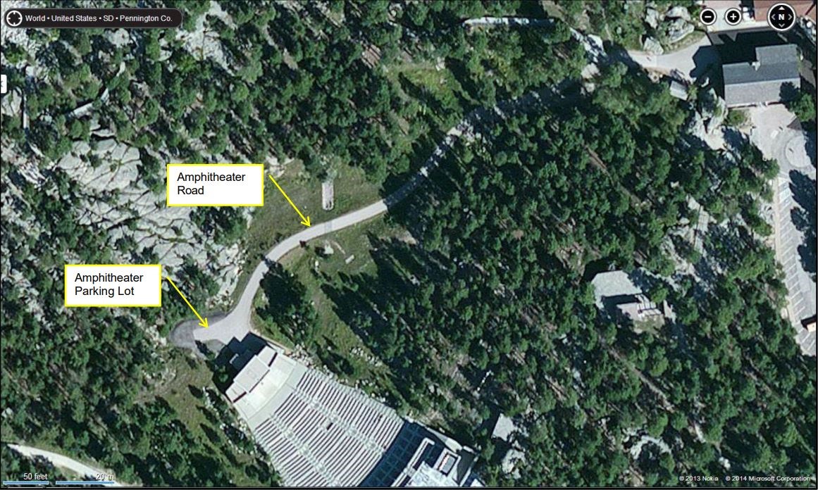 Aerial view showing the amphitheater road and parking lot, which are closed to the public one hour before to one hour after the Evening Lighting Program.
