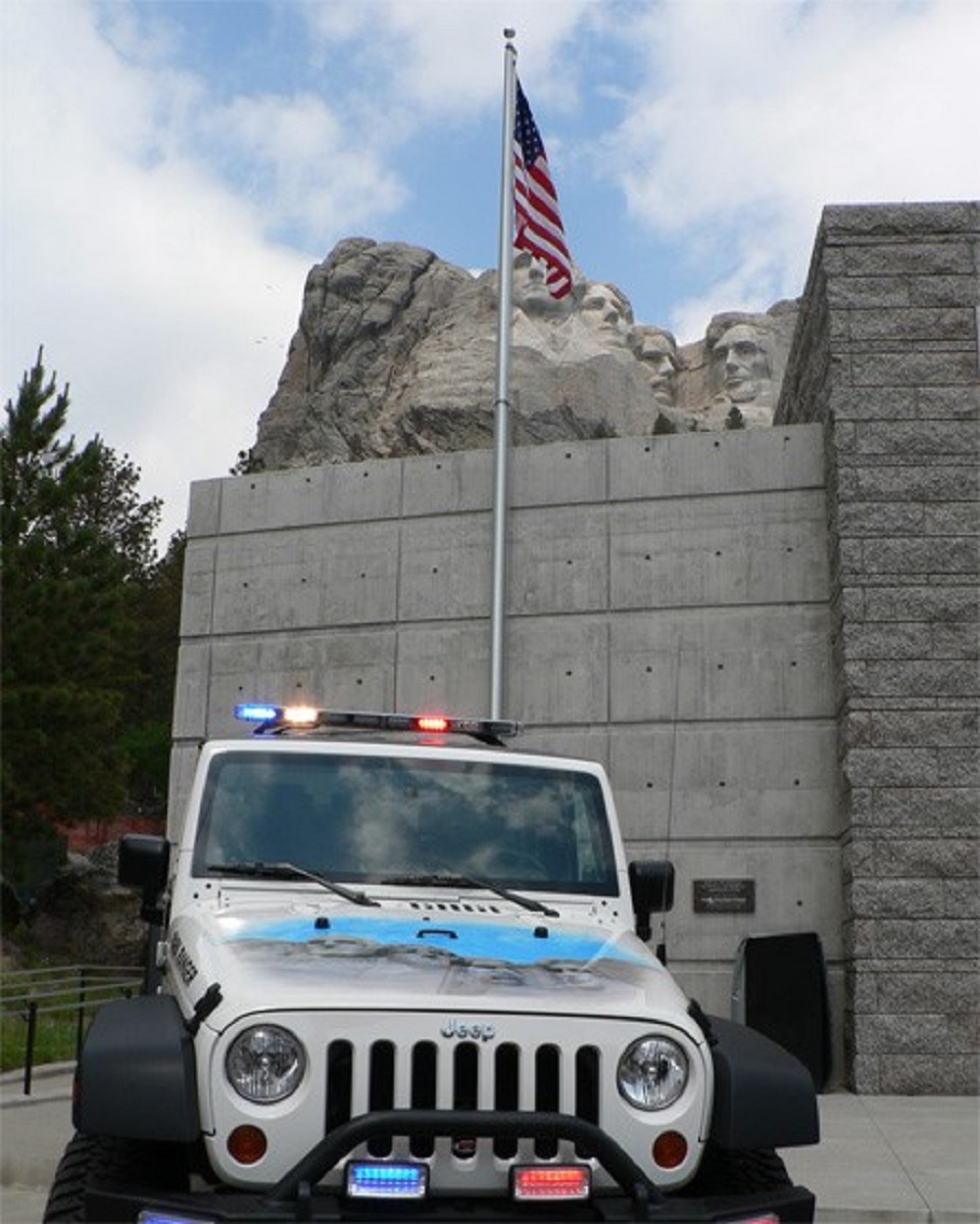 The new D.A.R.E. vehicle, with Mount Rushmore in the background, will be used to promote the mission of the Drug Abuse Resistance Education Program to the local community and throughout western South Dakota.