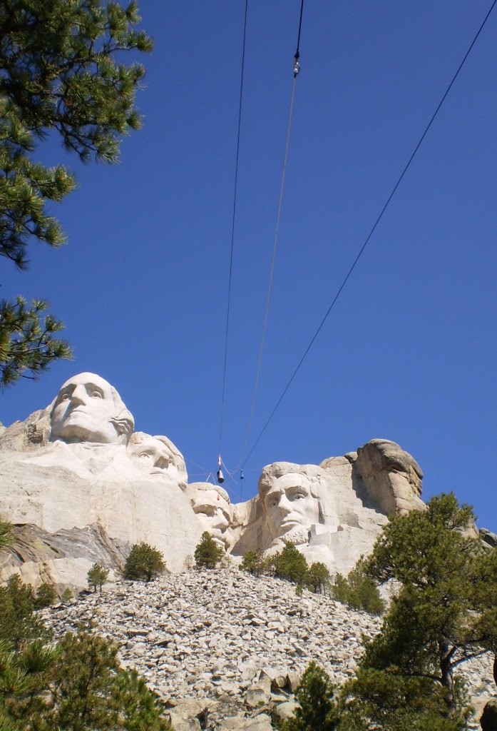 Alpine high line transport system in place with ropes running from the Presidential Trail to the top of Theodore Roosevelt's head.