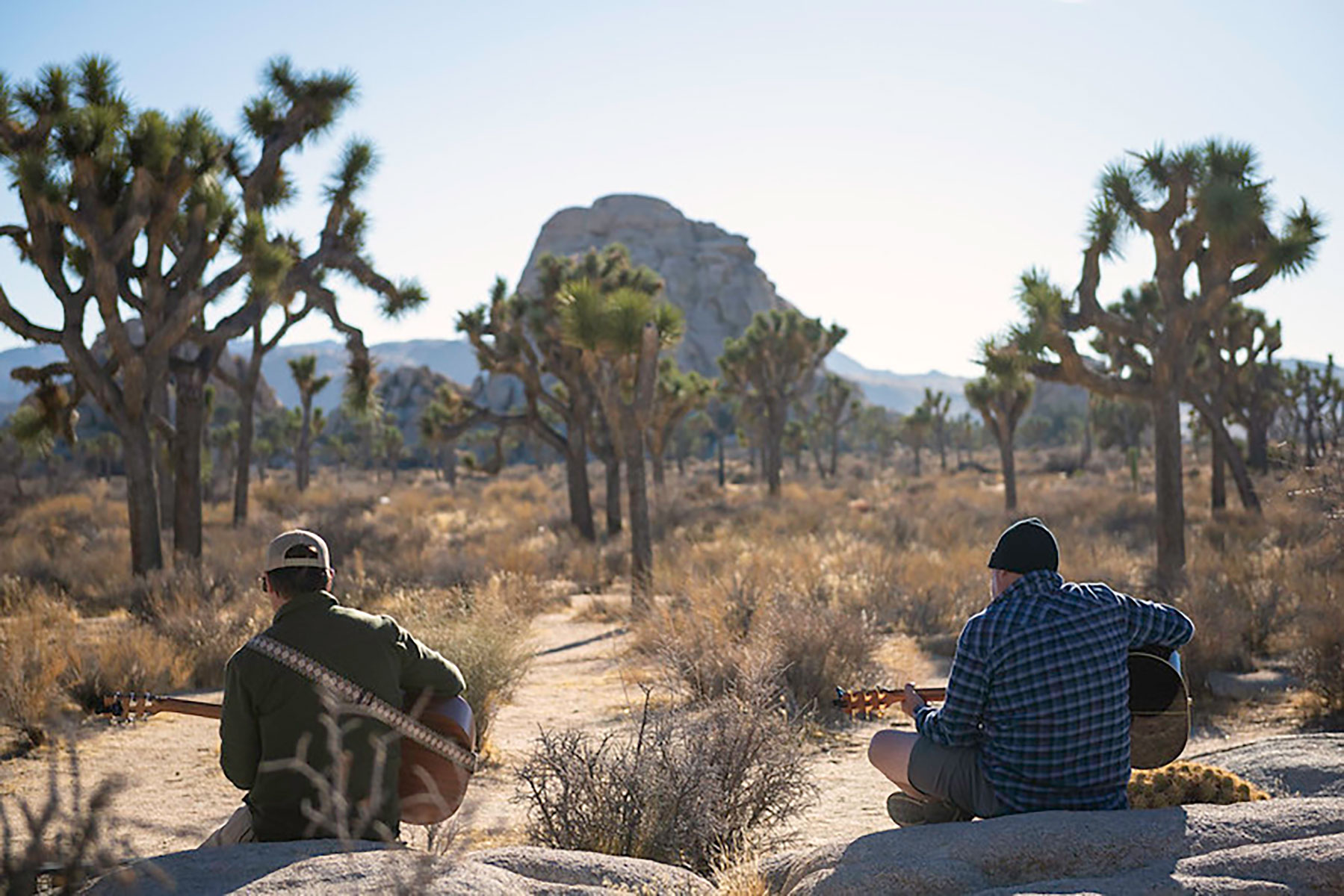 Two guitar players near Intersection Rock